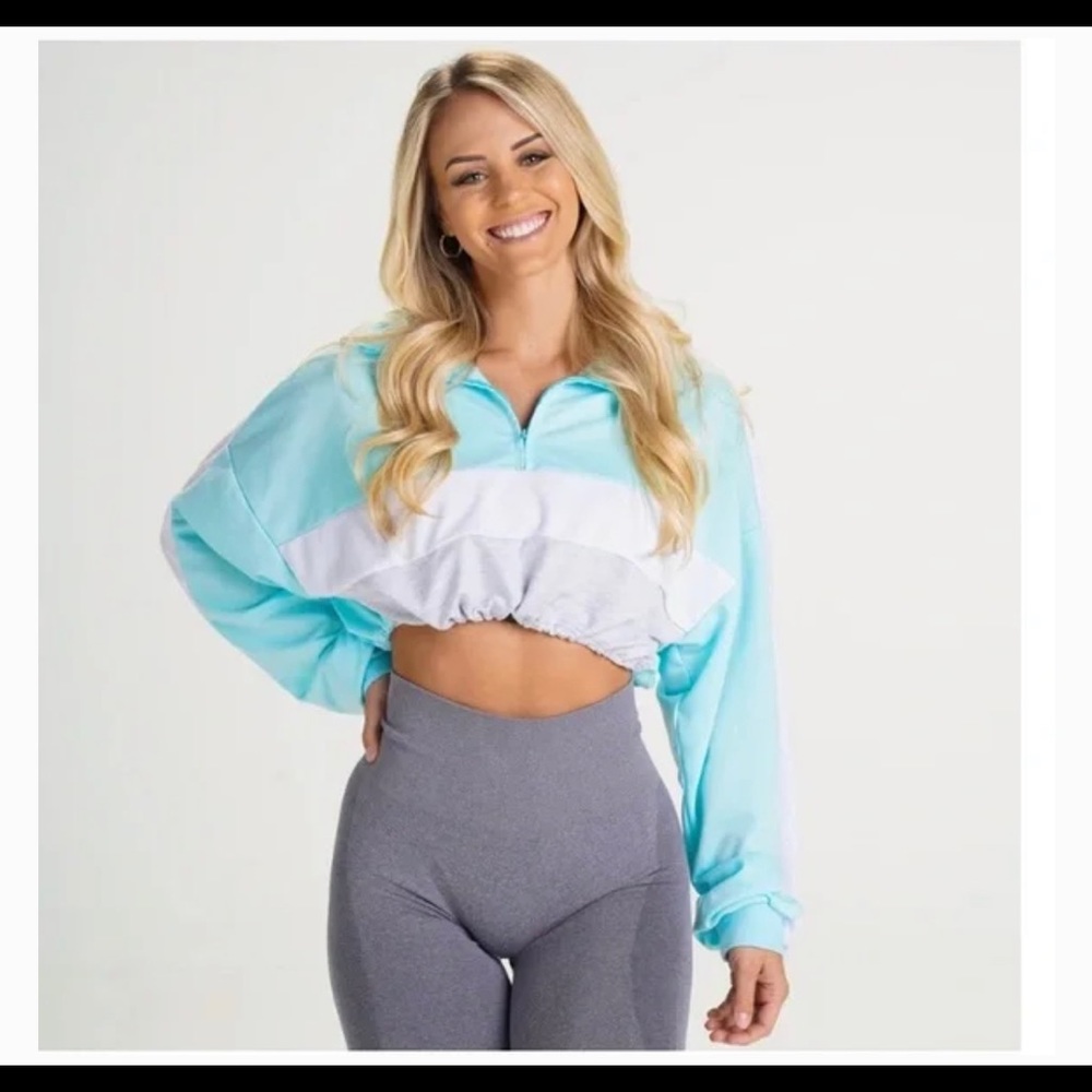 NVGTN Aqua Cropped Pull over jacket size SMALL